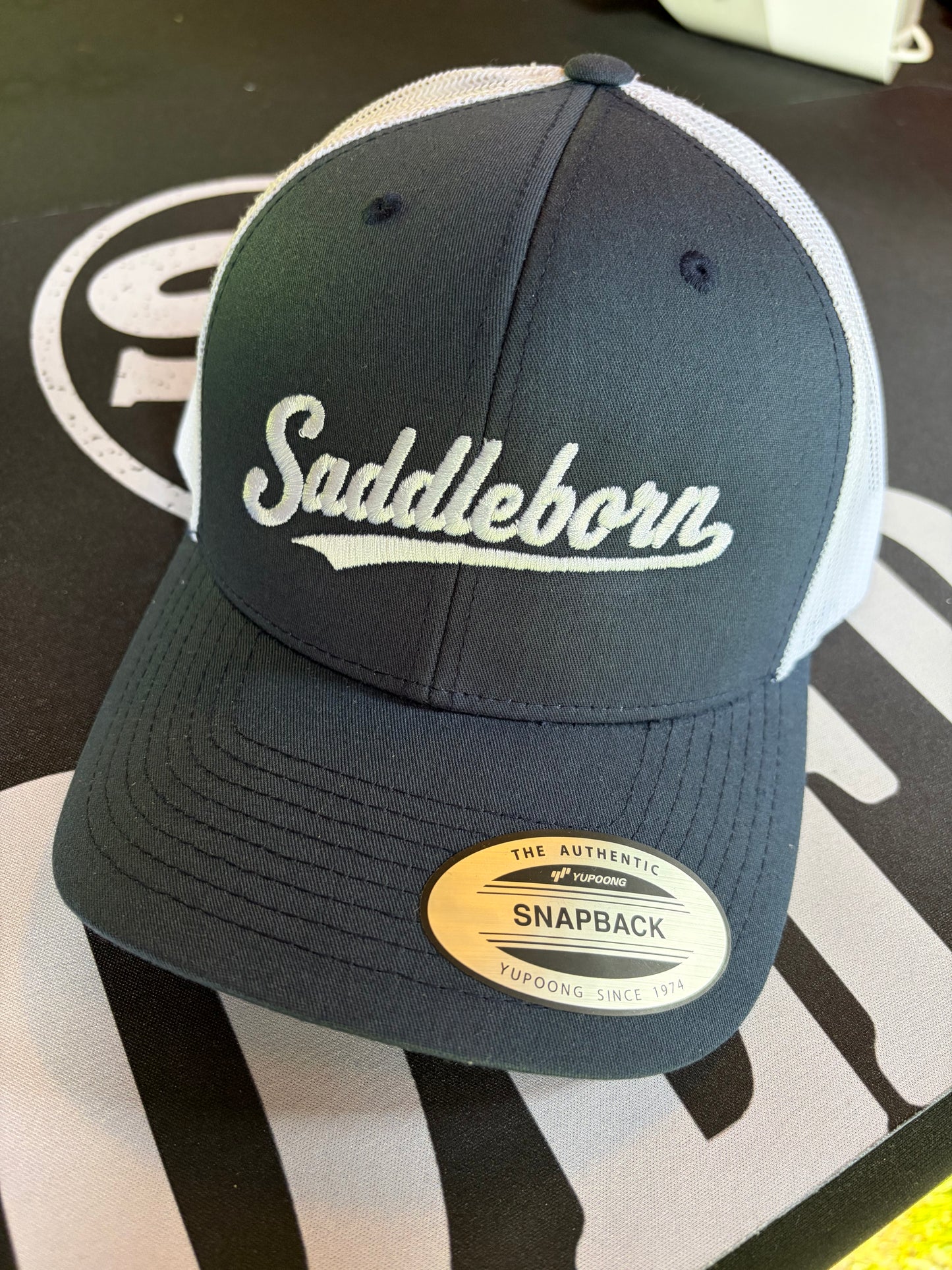 SADDLEBORN Varsity Trucker Cap
